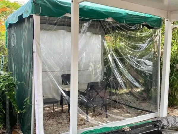 Outdoor tent with clear plastic walls