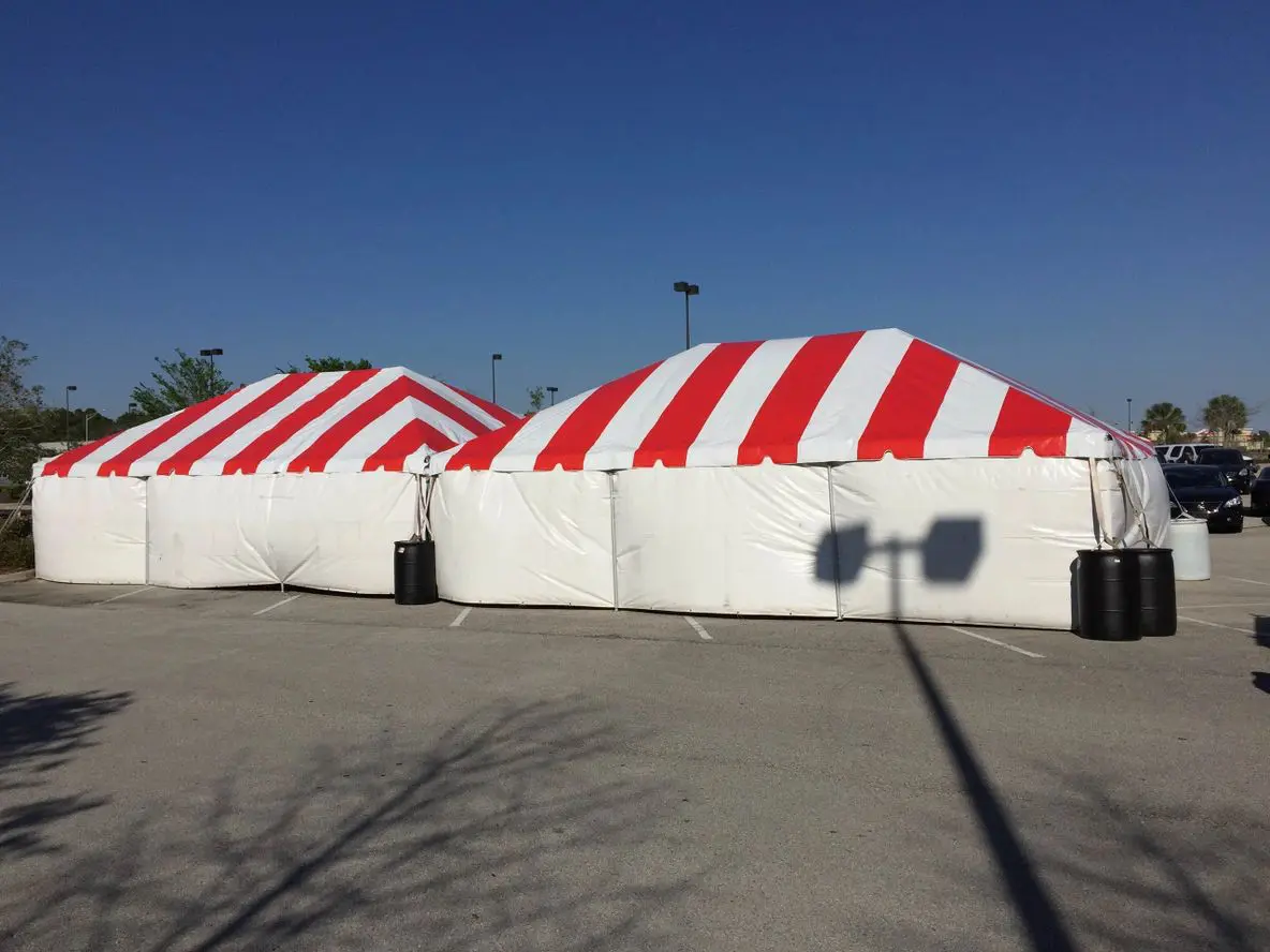 Two large event tents with stripes.