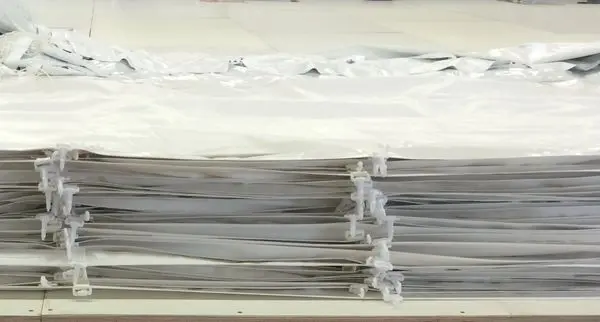 Pile of folded white plastic bags