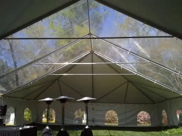 Clear tent setup in a garden