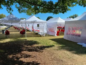 White tents set up in a park