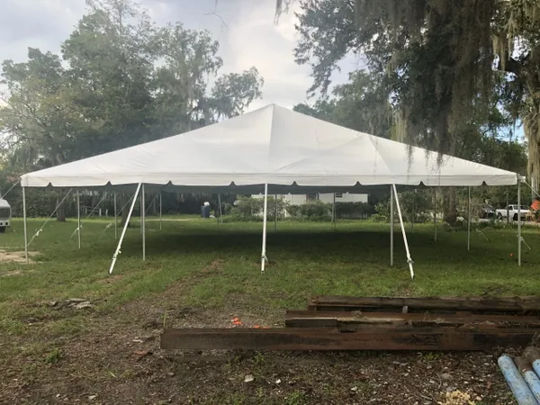 Spacious tent on grassy field