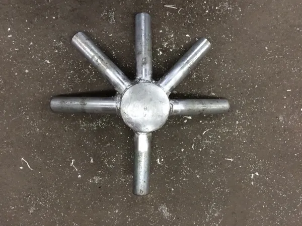Metal object with six protruding rods