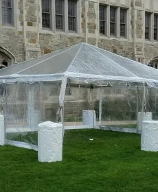 Clear tent on grass lawn