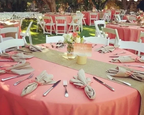 Outdoor wedding reception with decorated tables
