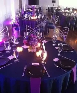 Formal dining setup with floral centerpiece