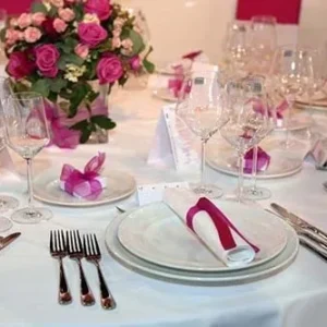 Elegant table setting with pink accents