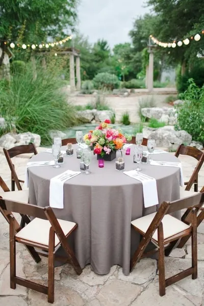 Garden table setting with colorful centerpiece