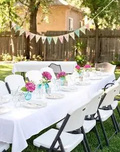 Festive backyard setup with bunting flags