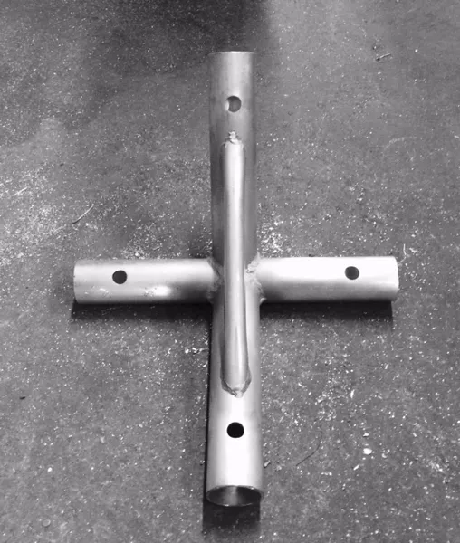 Industrial metal pipe with holes