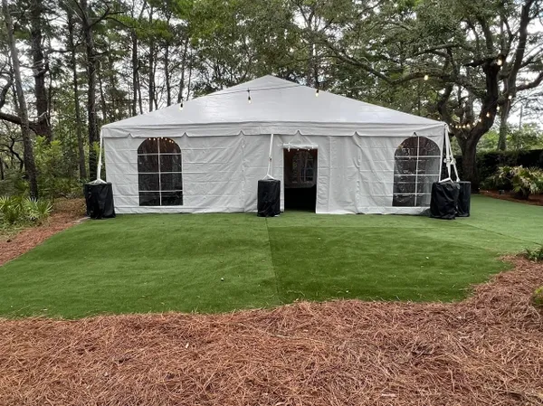 Large white canopy with clear windows