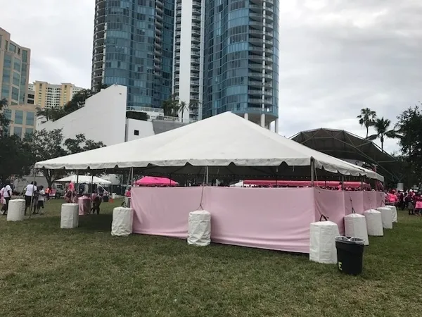 Tall buildings behind event tent