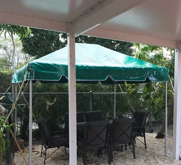 Backyard setup with covered seating area