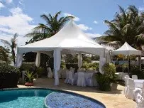 Outdoor event tent by a pool