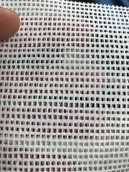 Textured white grid fabric detail