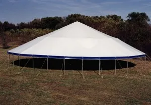 Large white tent on grassy field