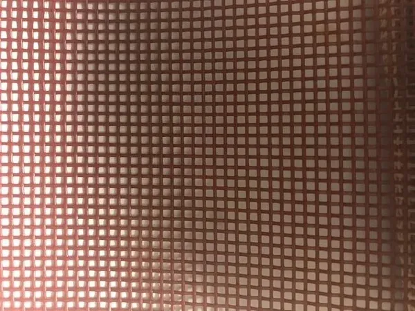 Close-up of red mesh texture