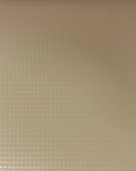 Beige grid-patterned surface texture