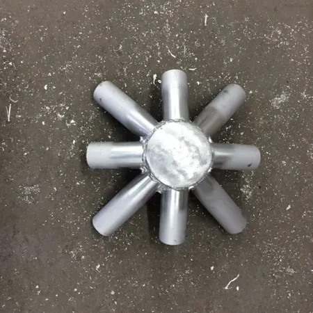 Metallic star-shaped object on concrete floor