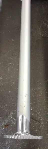 Metallic pole on concrete floor