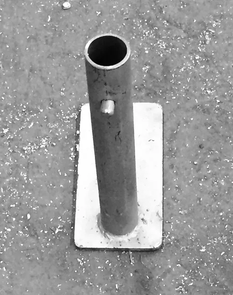 Metal pole with rectangular base