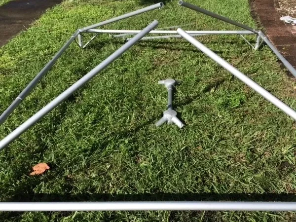 Tent structure laid out on lawn