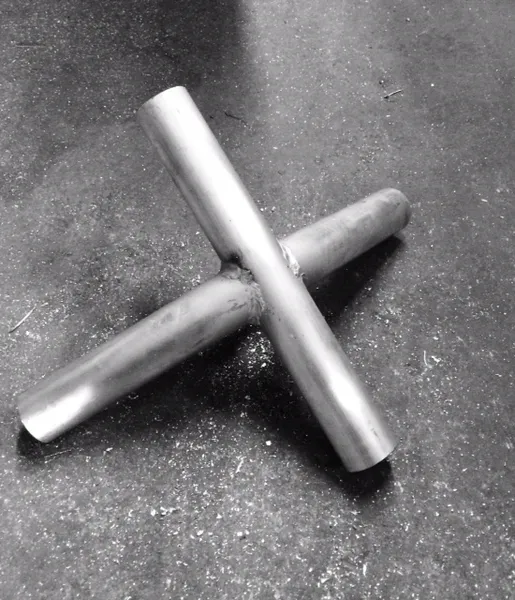 Metal rods welded in an X shape