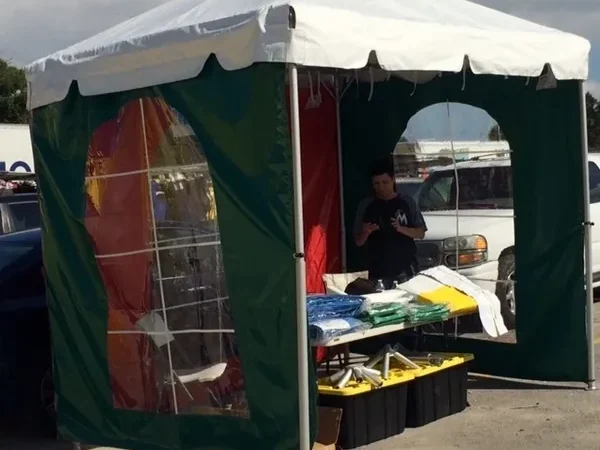 Pop-up tent with display table