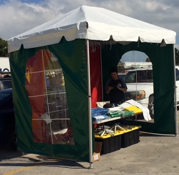 Green tent with table setup outside