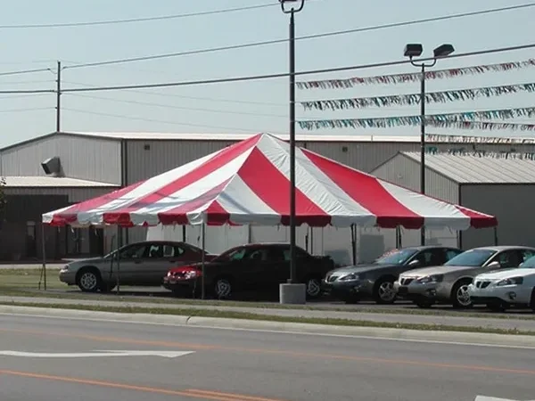 Outdoor event tent covering vehicles