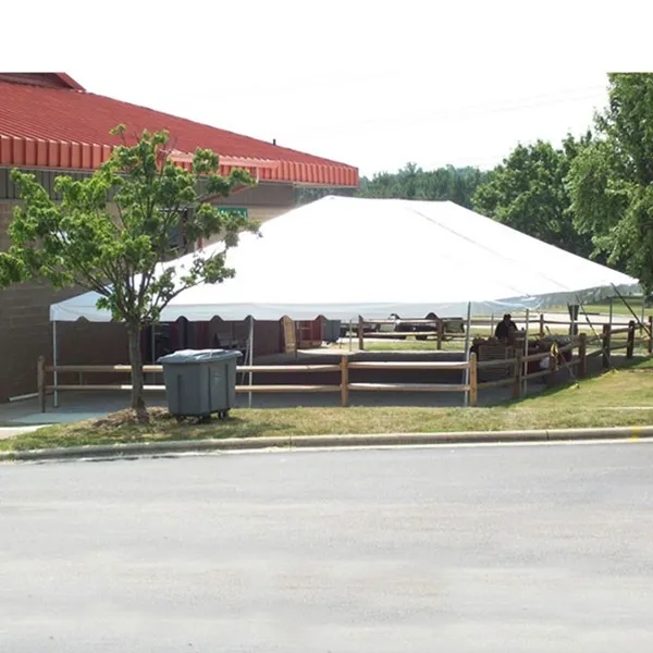 Outdoor tent setup beside a building