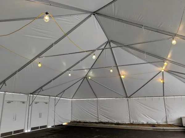 Interior view of a large event tent.