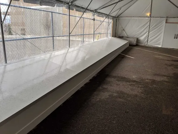 Covered area with large white surface