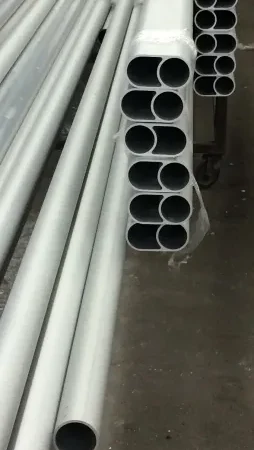 Metal pipes stacked in a warehouse