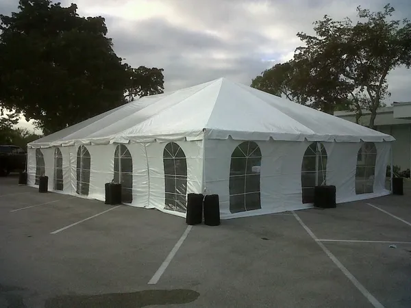 Square white pavilion tent with semi-circle windows