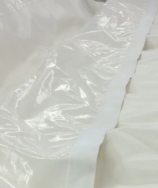 White plastic sheet with reflective surface