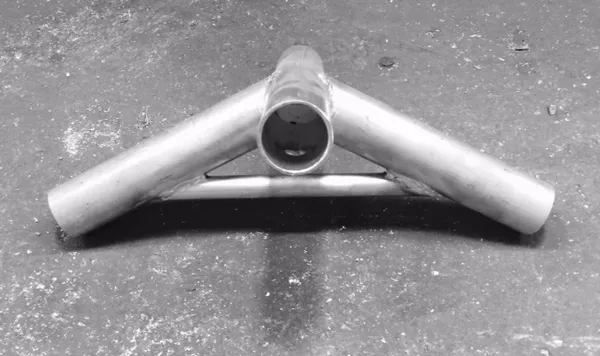 Metal pipe structure on concrete floor
