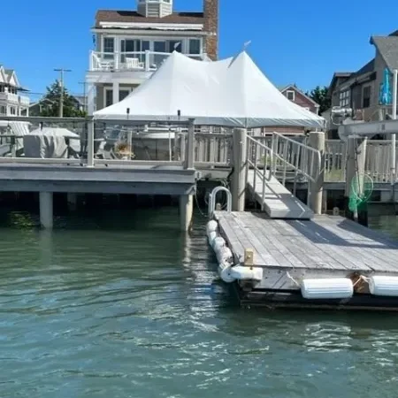Waterfront home with wooden dock