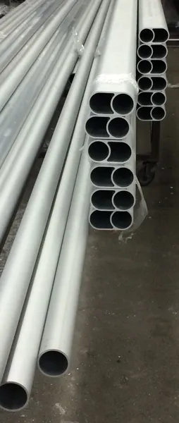 Metal pipes stacked in a workshop