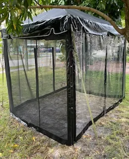 Screened gazebo on grassy lawn