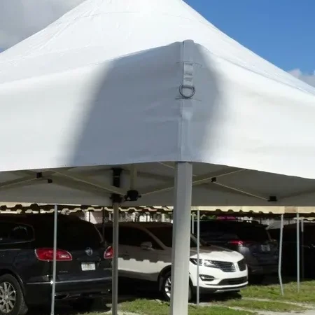 White event tent under blue sky