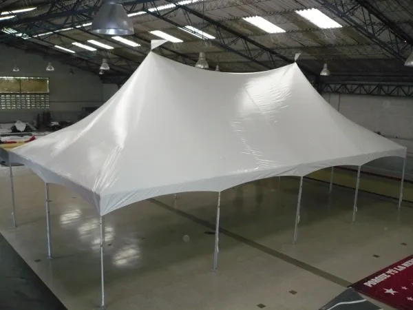 Large white event tent indoors
